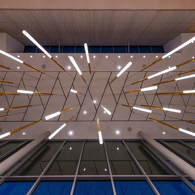 Architectural lighting detail within the lobby of the Boschini Music Center