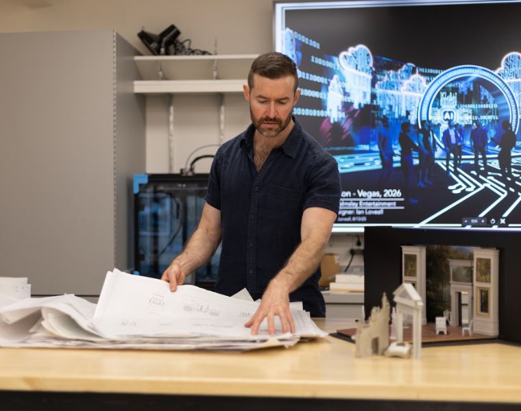 Loveall reviews set design plans. Photo: Regan Simeon