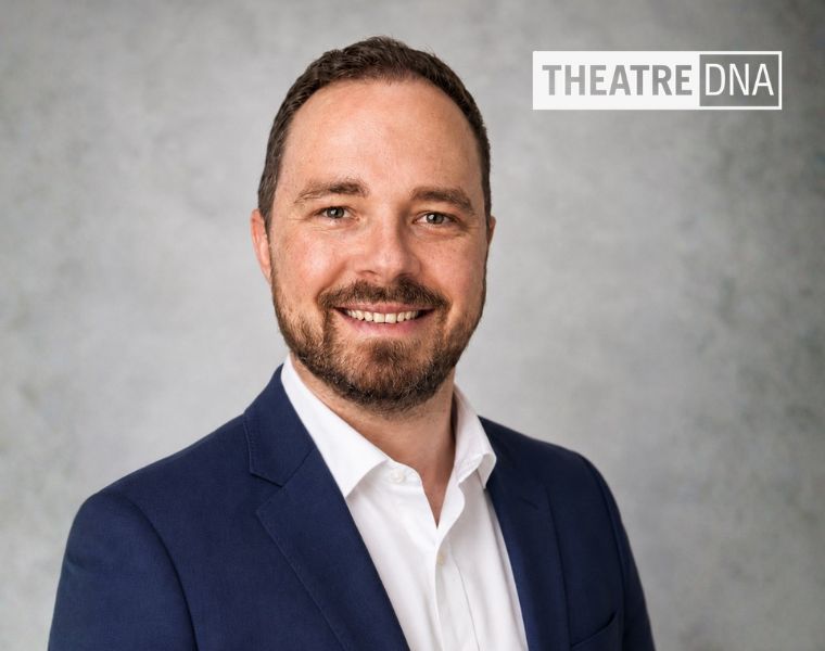 Zachary Briscoe headshot with TheatreDNA logo in the upper righthand corner.