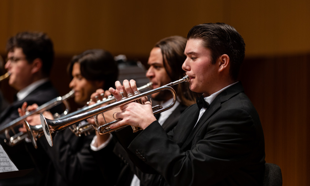 Students playing trumpets