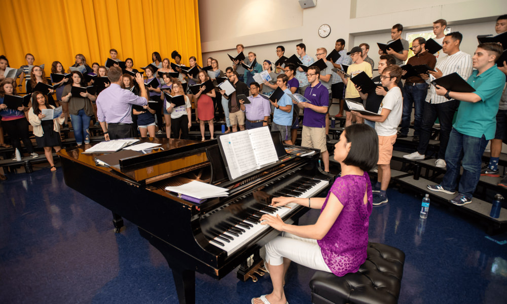 Choir of students rehearsing